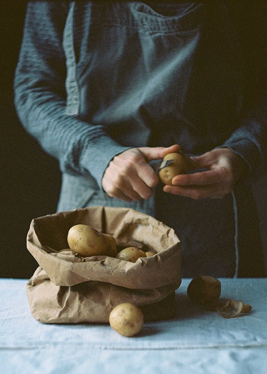 Peeling potatoes Poster
